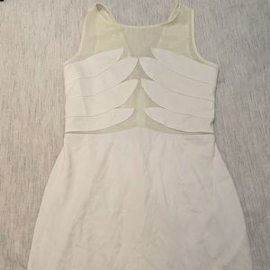 White Bebe dress very comfortable and stretchy! Worn once.
